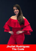 Jhuliet Rodríguez, The Code Ruby leader, in a professional portrait wearing red