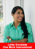 Leidy Encalada smiling confidently in a green shirt, appointed Regional Director for LATAM at One More International.